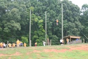 View of children completing obstacle course