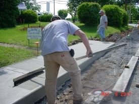 Men Working on Putting in Sidewalk